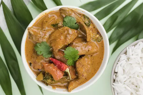 Sauté de porc au curry et lait de coco